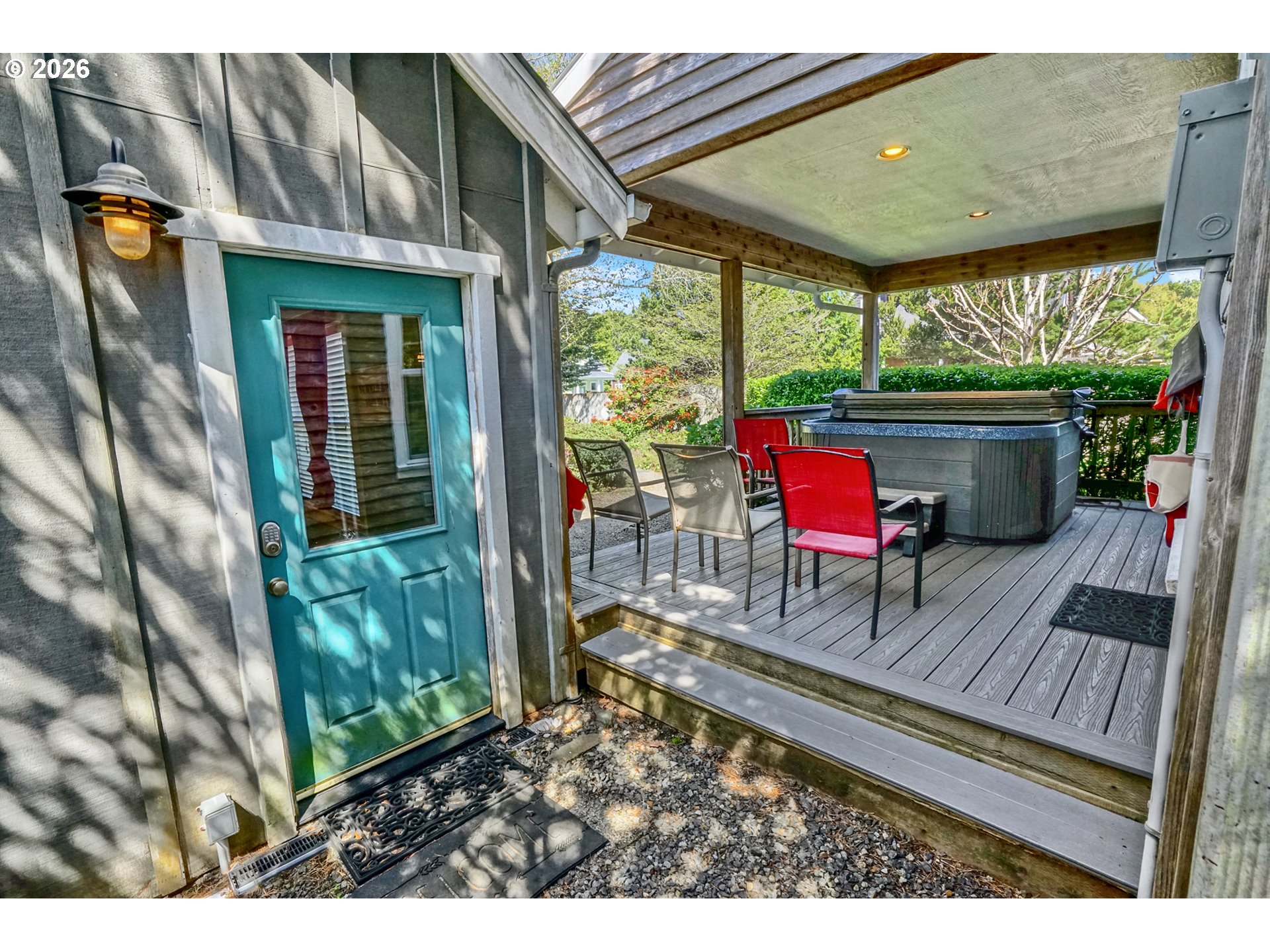 265 Bunchberry Way Depoe Bay, OR 97341 - Photo 36 of 48 a view of a chairs with a table in the patio