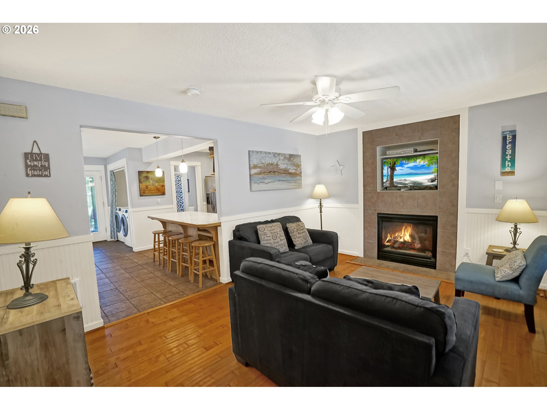 265 Bunchberry Way Depoe Bay, OR 97341 - Photo 4 of 48 a living room with furniture and a fireplace