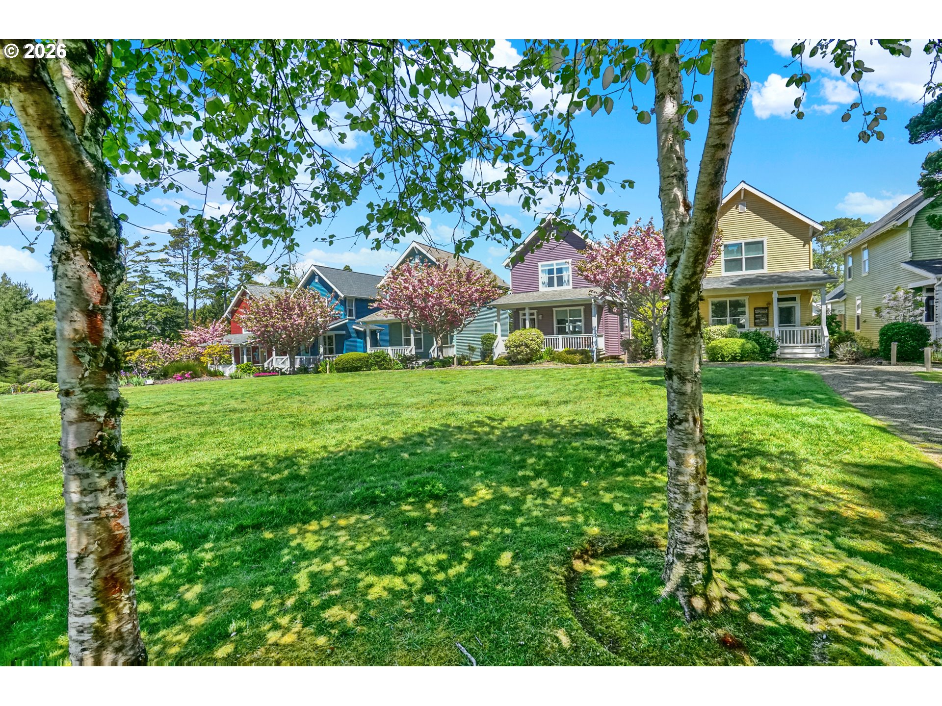 265 Bunchberry Way Depoe Bay, OR 97341 - Photo 45 of 48 a front view of a house with garden