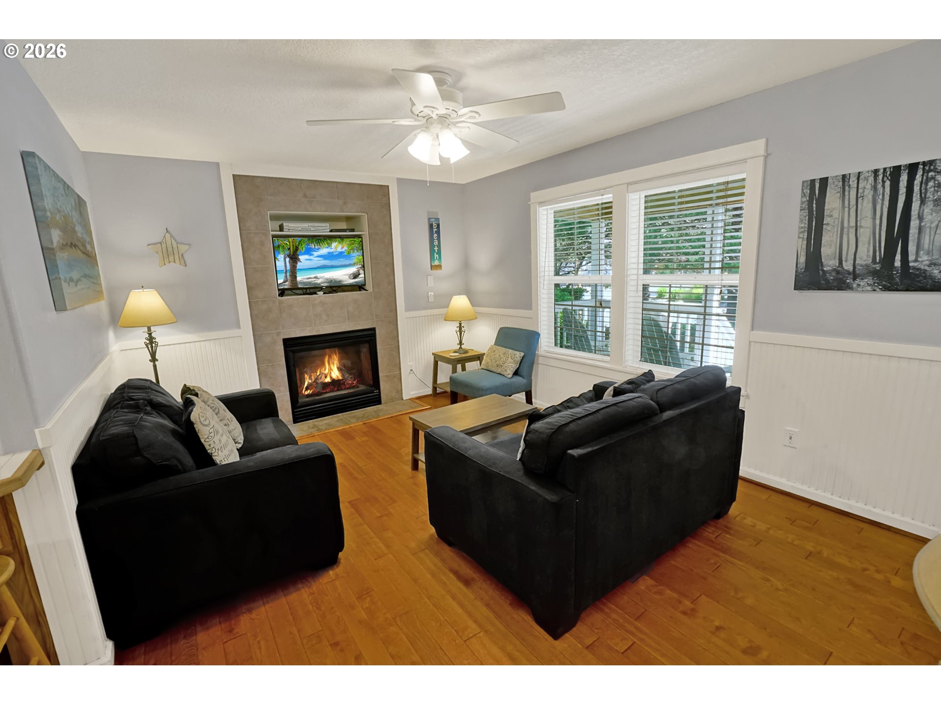 265 Bunchberry Way Depoe Bay, OR 97341 - Photo 5 of 48 a living room with furniture and a fireplace