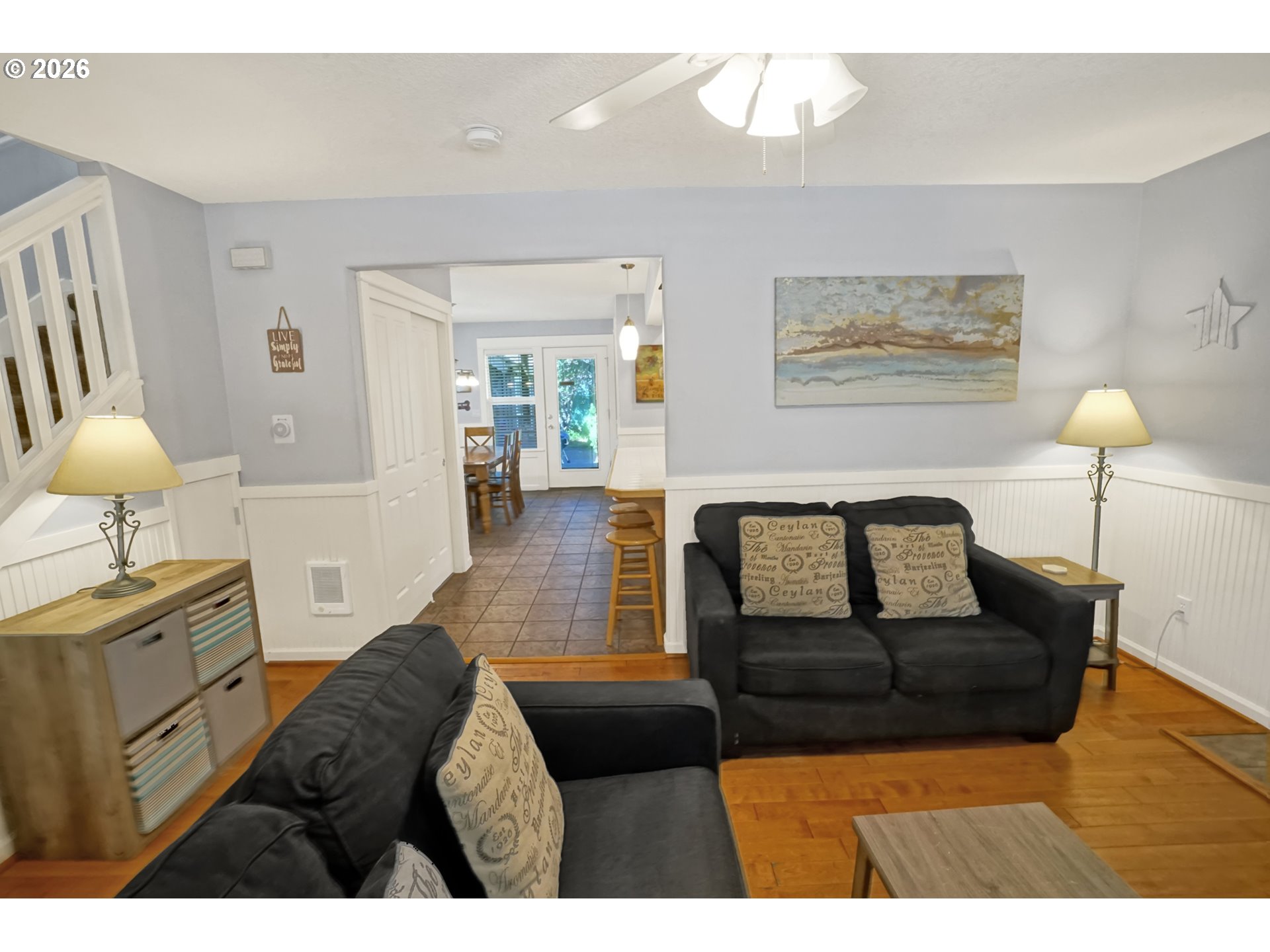 265 Bunchberry Way Depoe Bay, OR 97341 - Photo 7 of 48 a living room with furniture and a lamp