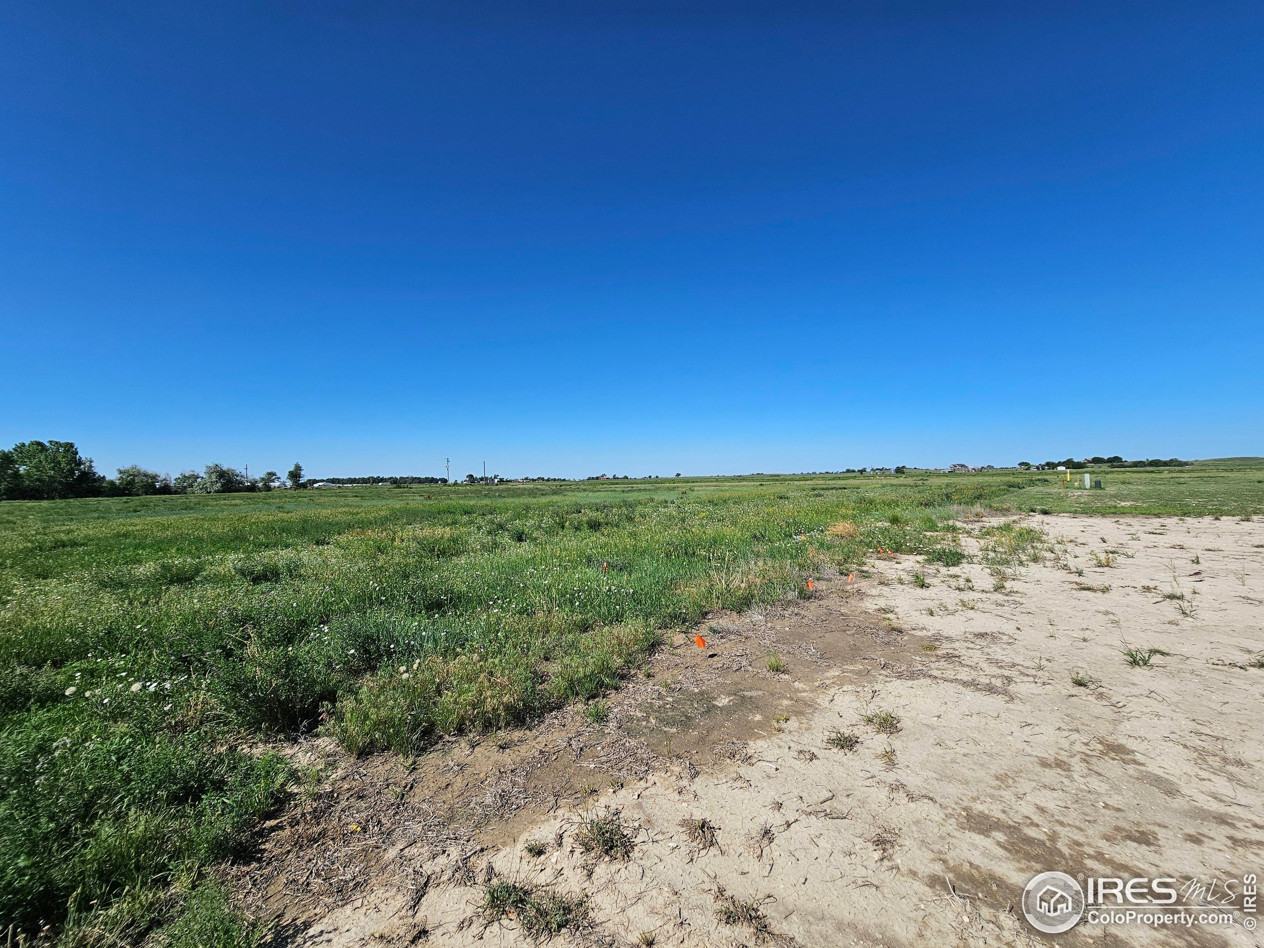 829 Nicole Road Sterling, CO 80751 - Photo 11 of 14 a view of beach and ocean