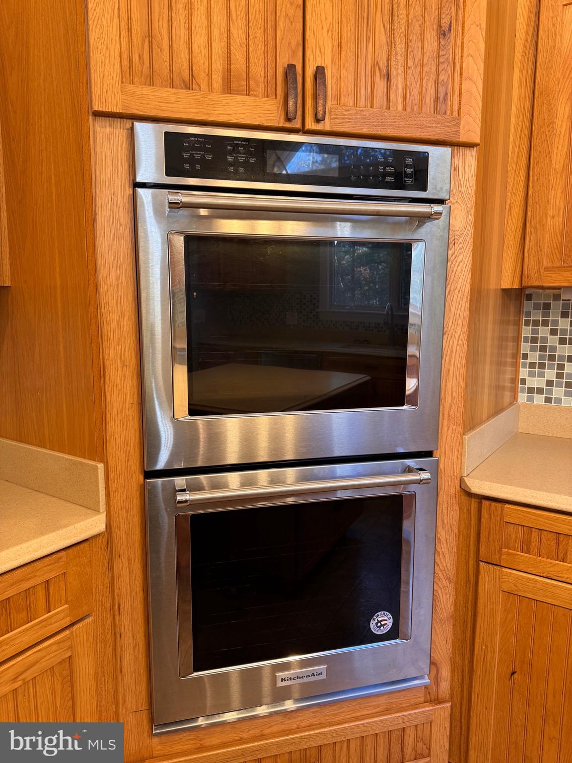 687 Prospect Hill Road Montross, VA 22520 - Photo 18 of 80 a stove top oven sitting inside of a kitchen