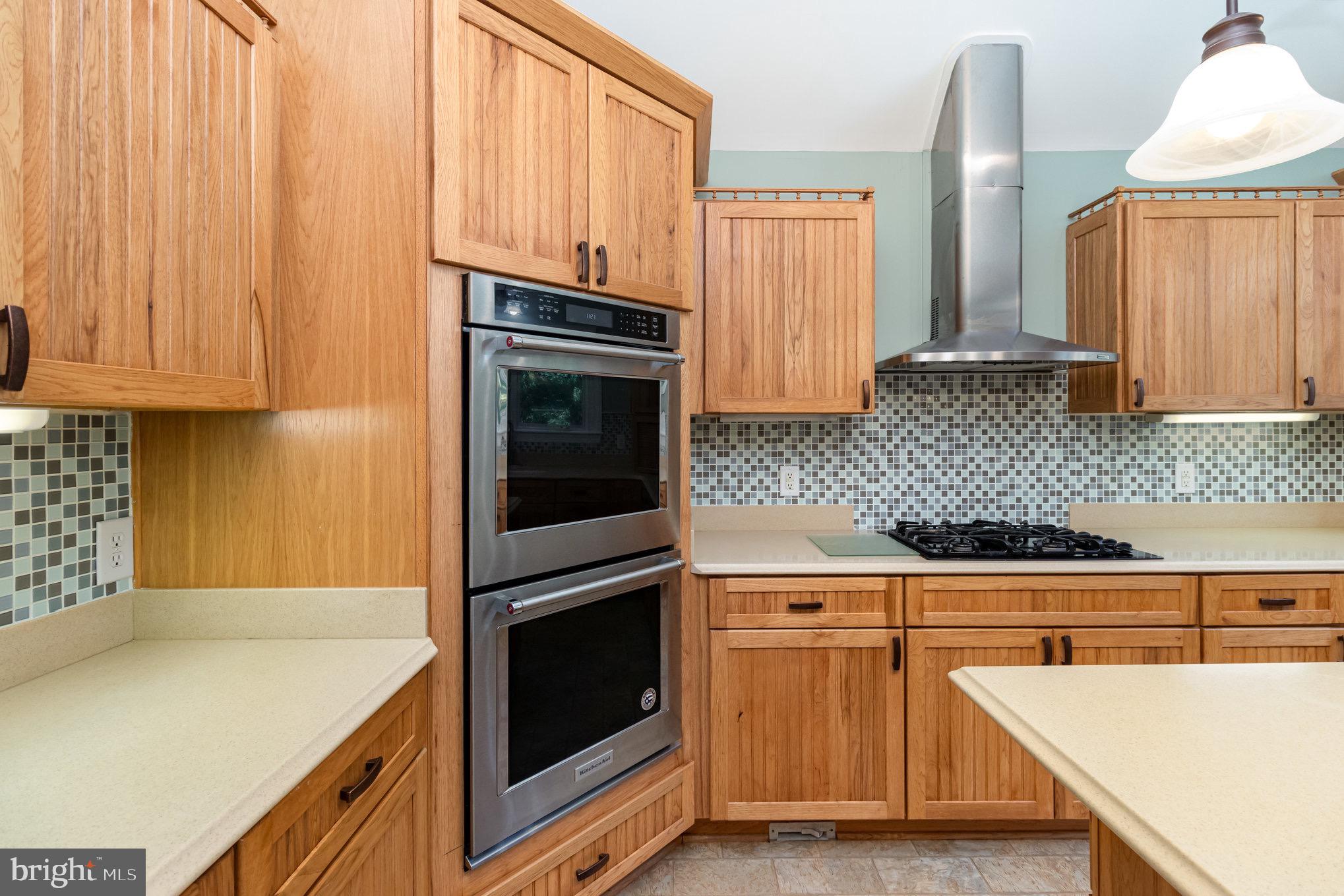 687 Prospect Hill Road Montross, VA 22520 - Photo 19 of 80 a kitchen with granite countertop cabinets stainless steel appliances and a sink