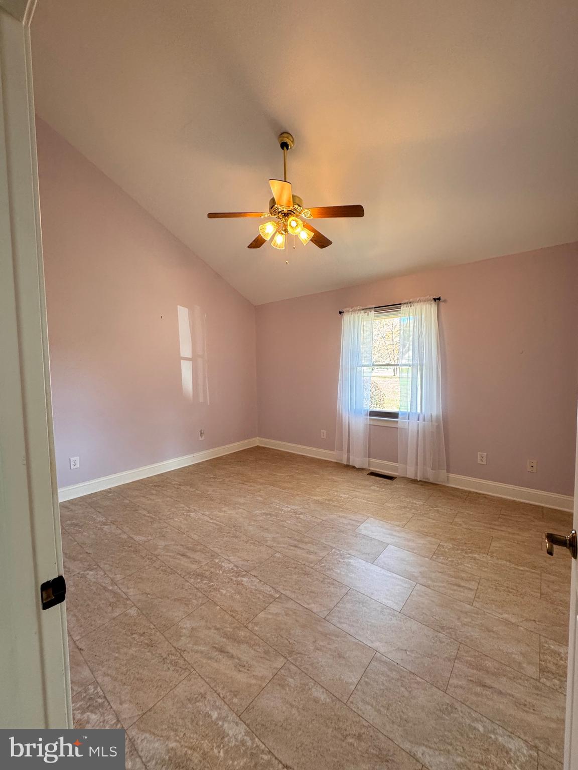 687 Prospect Hill Road Montross, VA 22520 - Photo 30 of 80 wooden floor in an empty room with a window