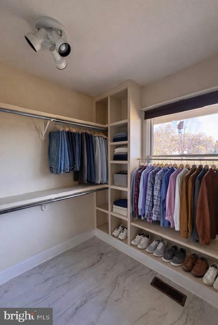 687 Prospect Hill Road Montross, VA 22520 - Photo 38 of 80 a view of walk in closet with clothes and shoes