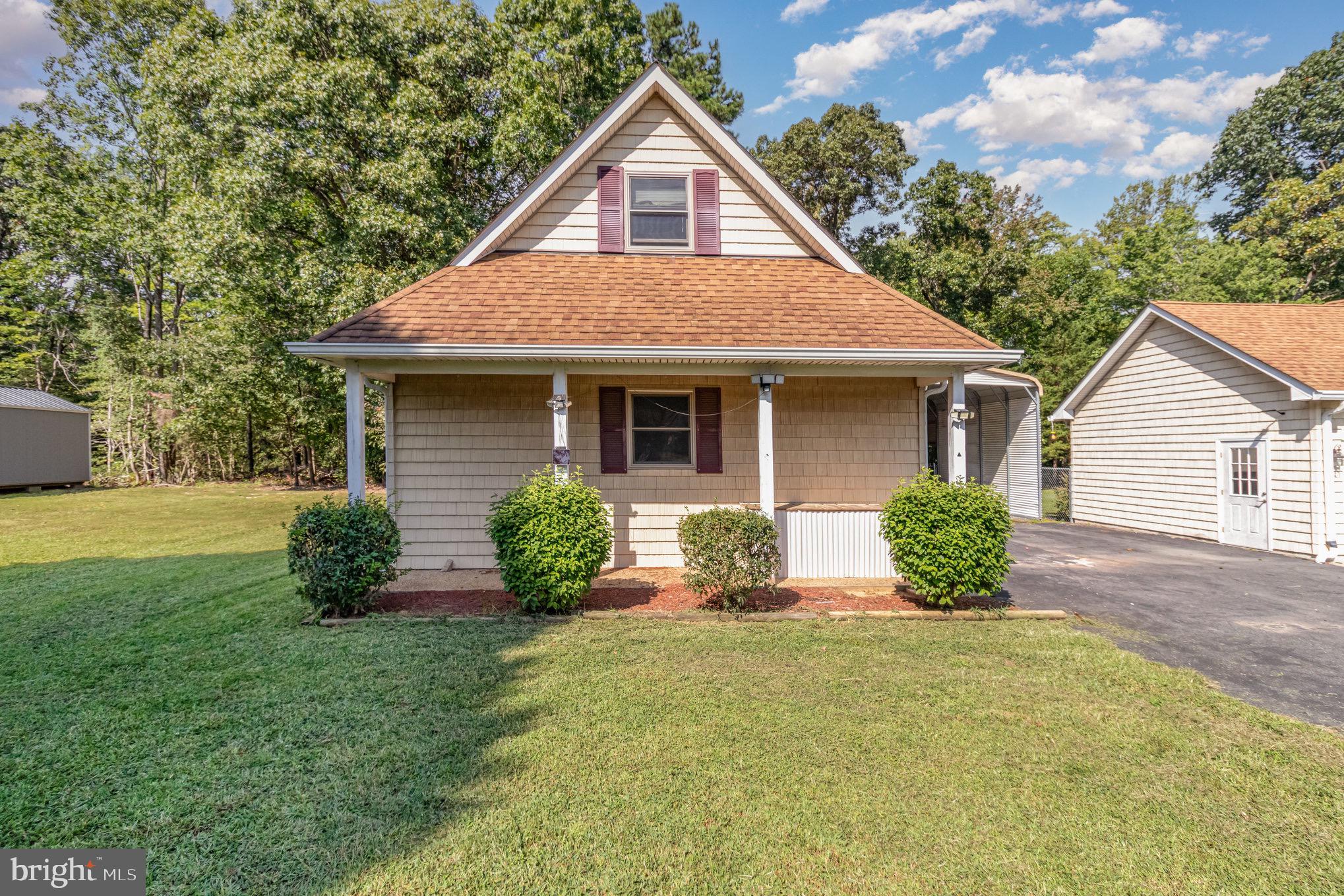 687 Prospect Hill Road Montross, VA 22520 - Photo 50 of 80 a front view of house with yard and green space