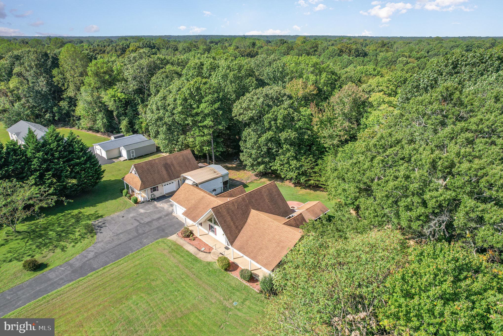 687 Prospect Hill Road Montross, VA 22520 - Photo 64 of 80 an aerial view of a house with a yard
