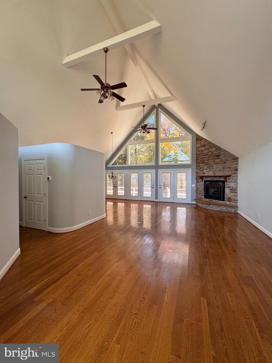 687 Prospect Hill Road Montross, VA 22520 - Photo 8 of 80 wooden floor in an empty room with a window