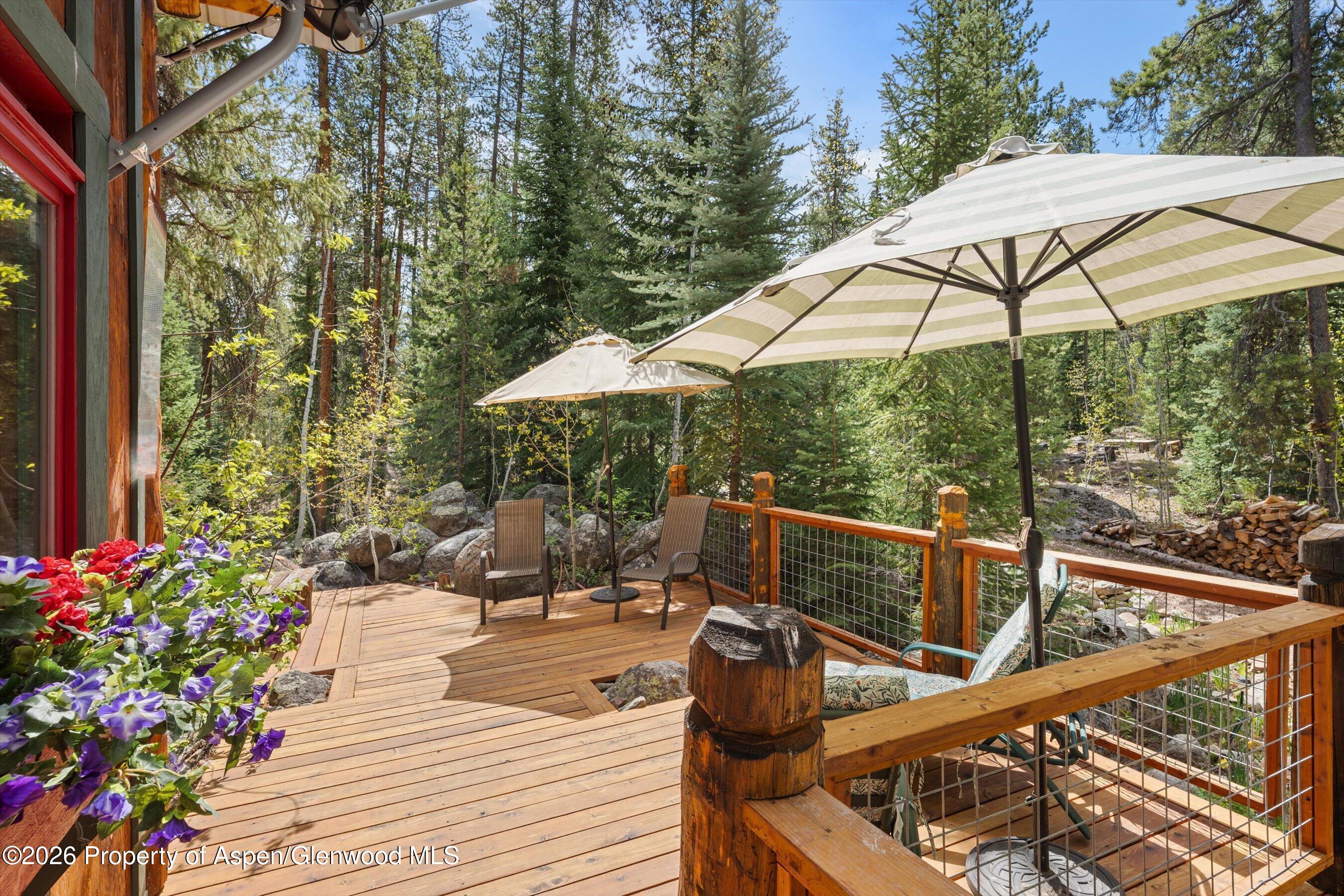26608 Frying Pan Road Meredith, CO 81642 - Photo 15 of 49 a view of outdoor space yard deck patio and outdoor kitchen
