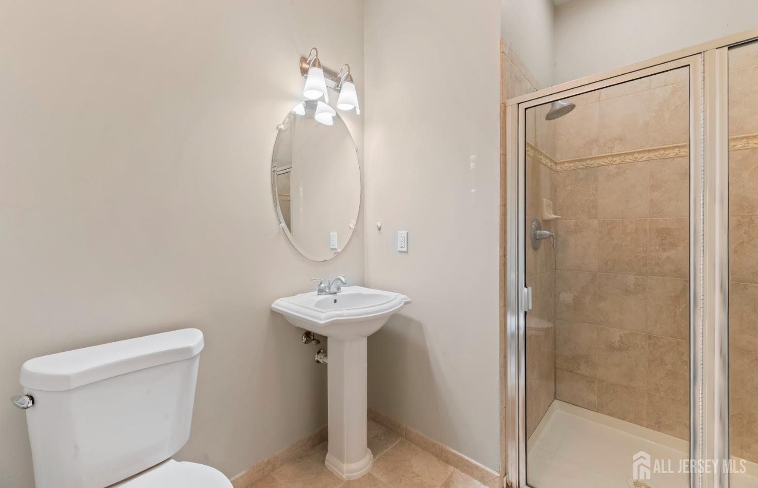 142 Conover Terrace Lebanon, NJ 08833 - Photo 11 of 33 a bathroom with a sink toilet and shower