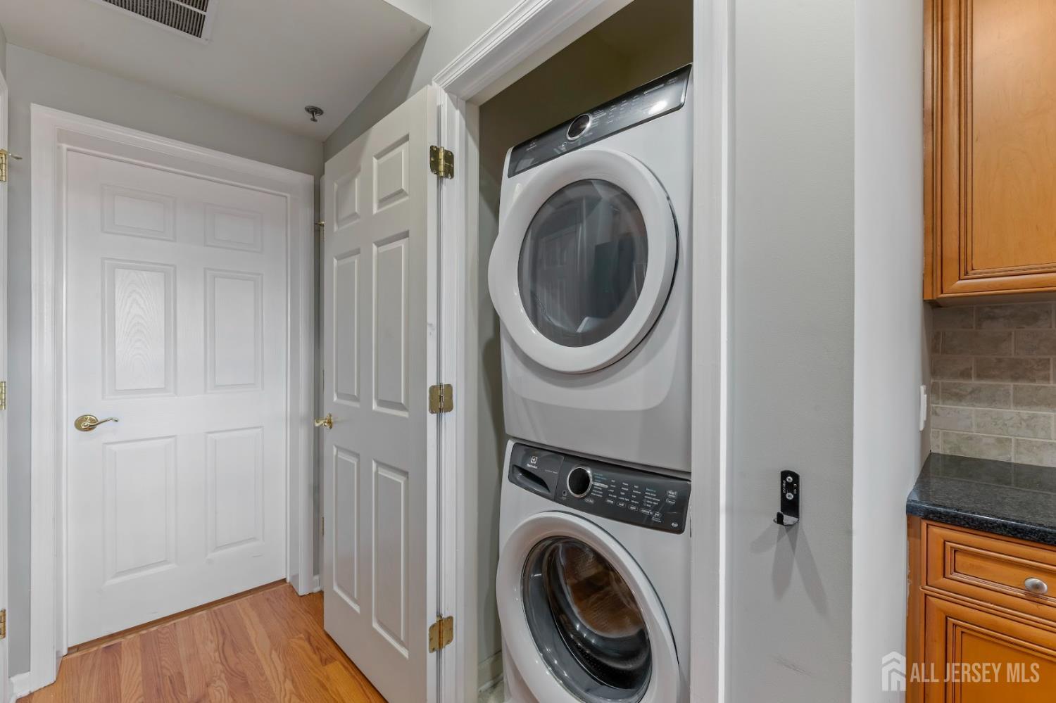 142 Conover Terrace Lebanon, NJ 08833 - Photo 12 of 33 a view of a hallway with washer and dryer