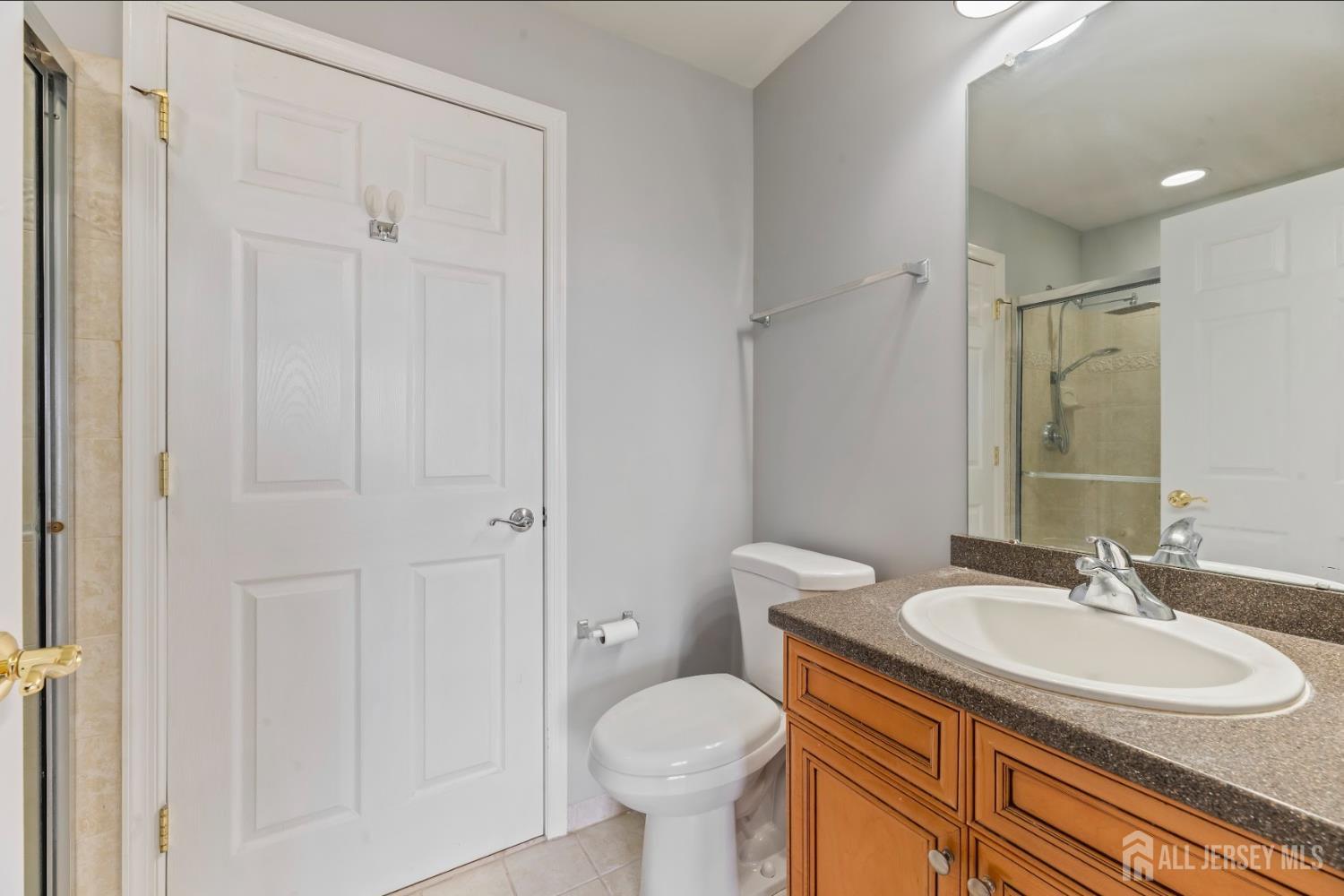 142 Conover Terrace Lebanon, NJ 08833 - Photo 15 of 33 a bathroom with a toilet sink and mirror