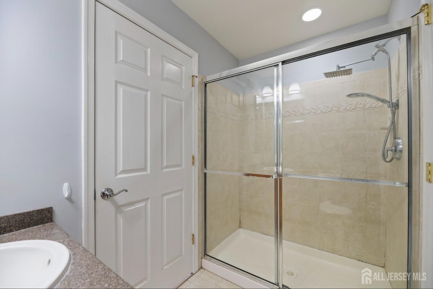142 Conover Terrace Lebanon, NJ 08833 - Photo 16 of 33 a bathroom with a shower and a sink