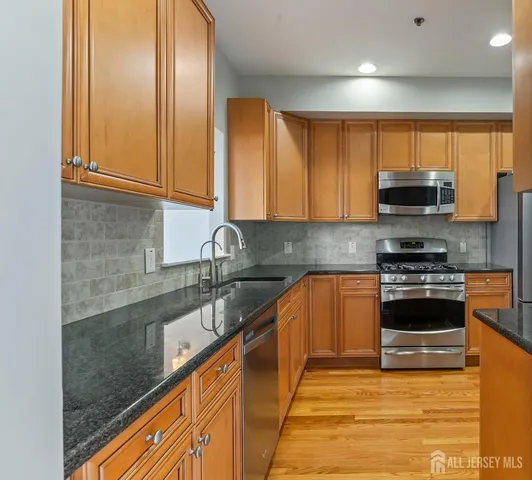 an empty room with a empty space and windows