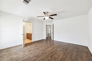 4910 Pacific Ridge Lane Rosenberg, TX 77469 - Photo 7 of 14 a view of an empty room and a ceiling fan