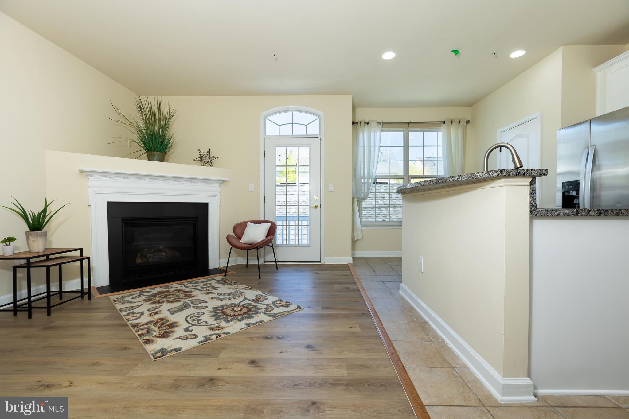 637 Spectator Avenue Landover, MD 20785 - Photo 16 of 54 a view of a livingroom with a fireplace and window