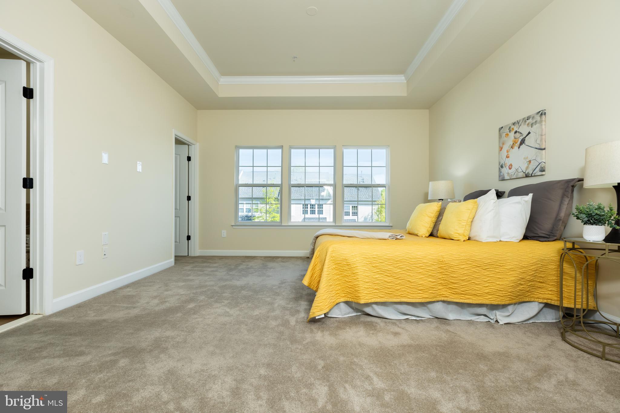 637 Spectator Avenue Landover, MD 20785 - Photo 21 of 54 a bed sitting in a bedroom next to a window