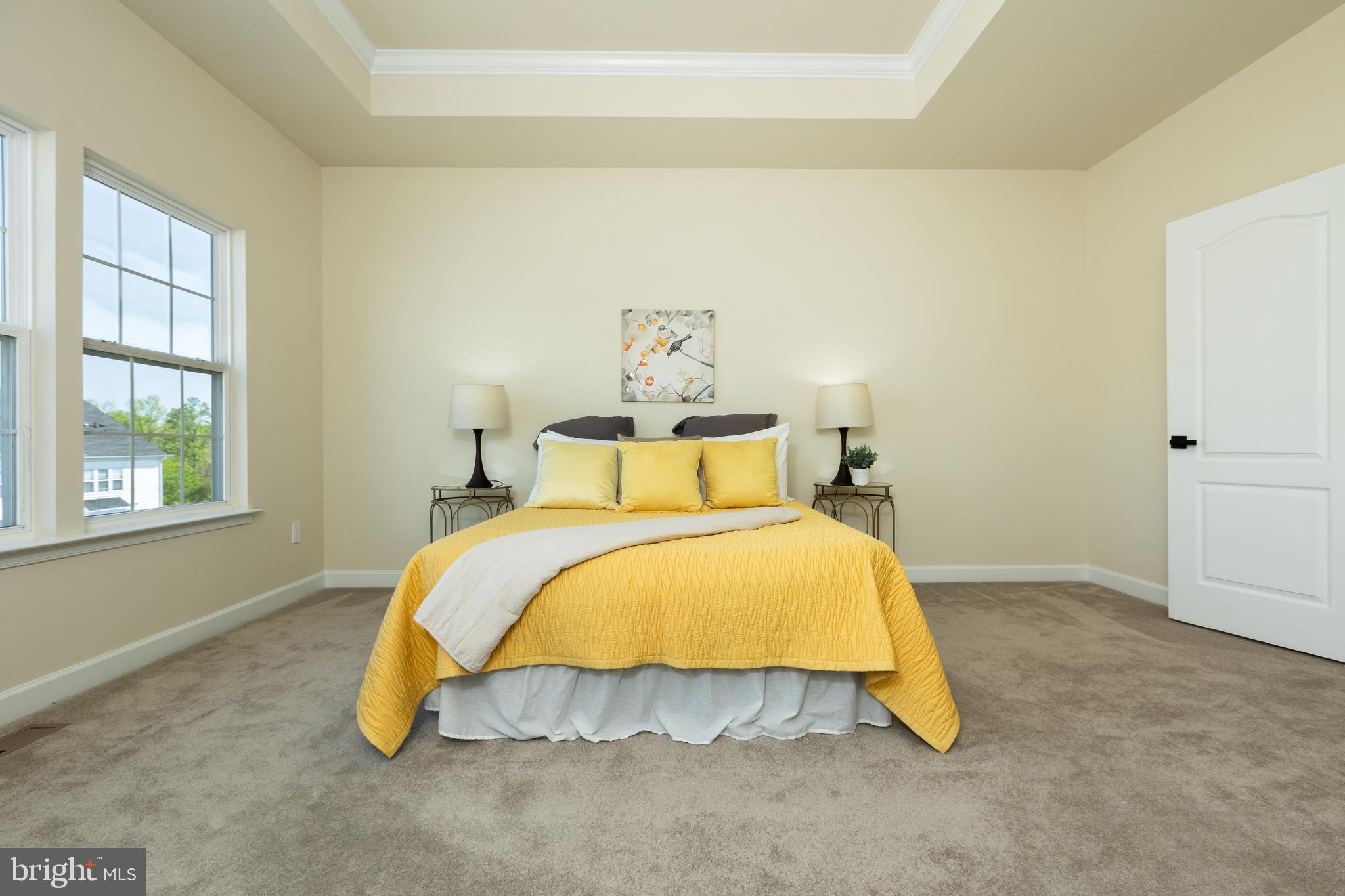 637 Spectator Avenue Landover, MD 20785 - Photo 25 of 54 a bed sitting in a bedroom next to a window