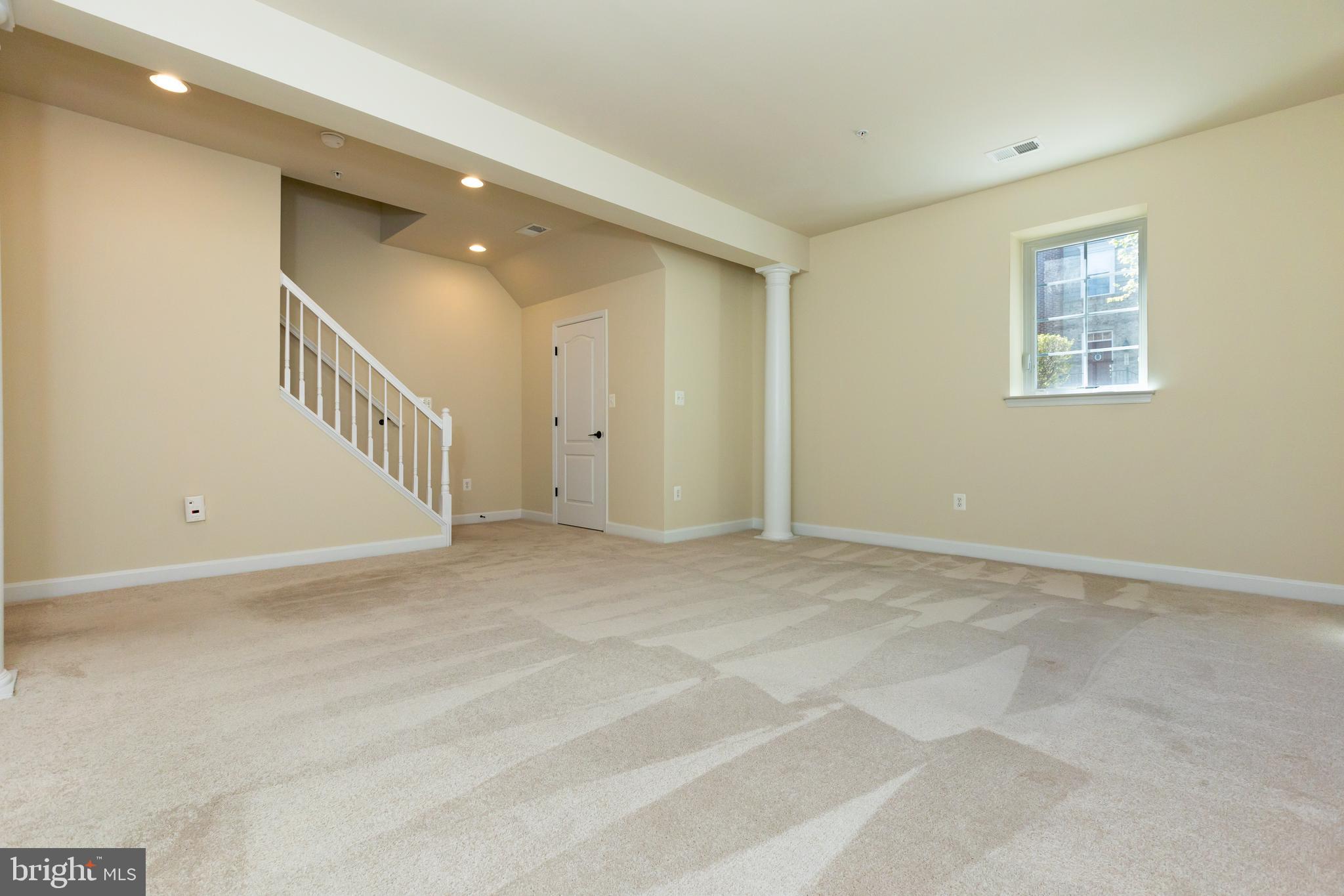 637 Spectator Avenue Landover, MD 20785 - Photo 39 of 54 a view of an empty room with a window
