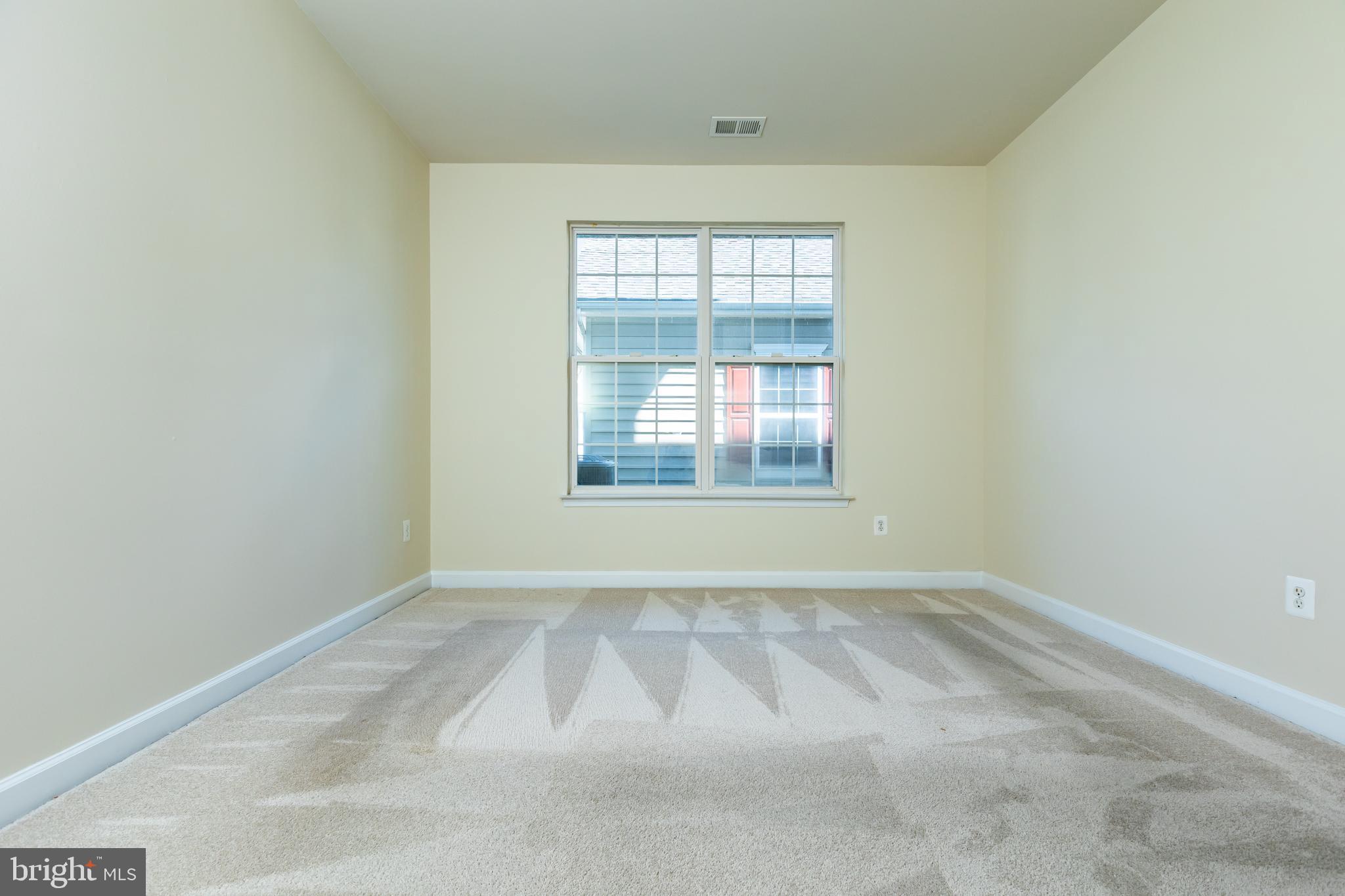 637 Spectator Avenue Landover, MD 20785 - Photo 43 of 54 an empty room with a window