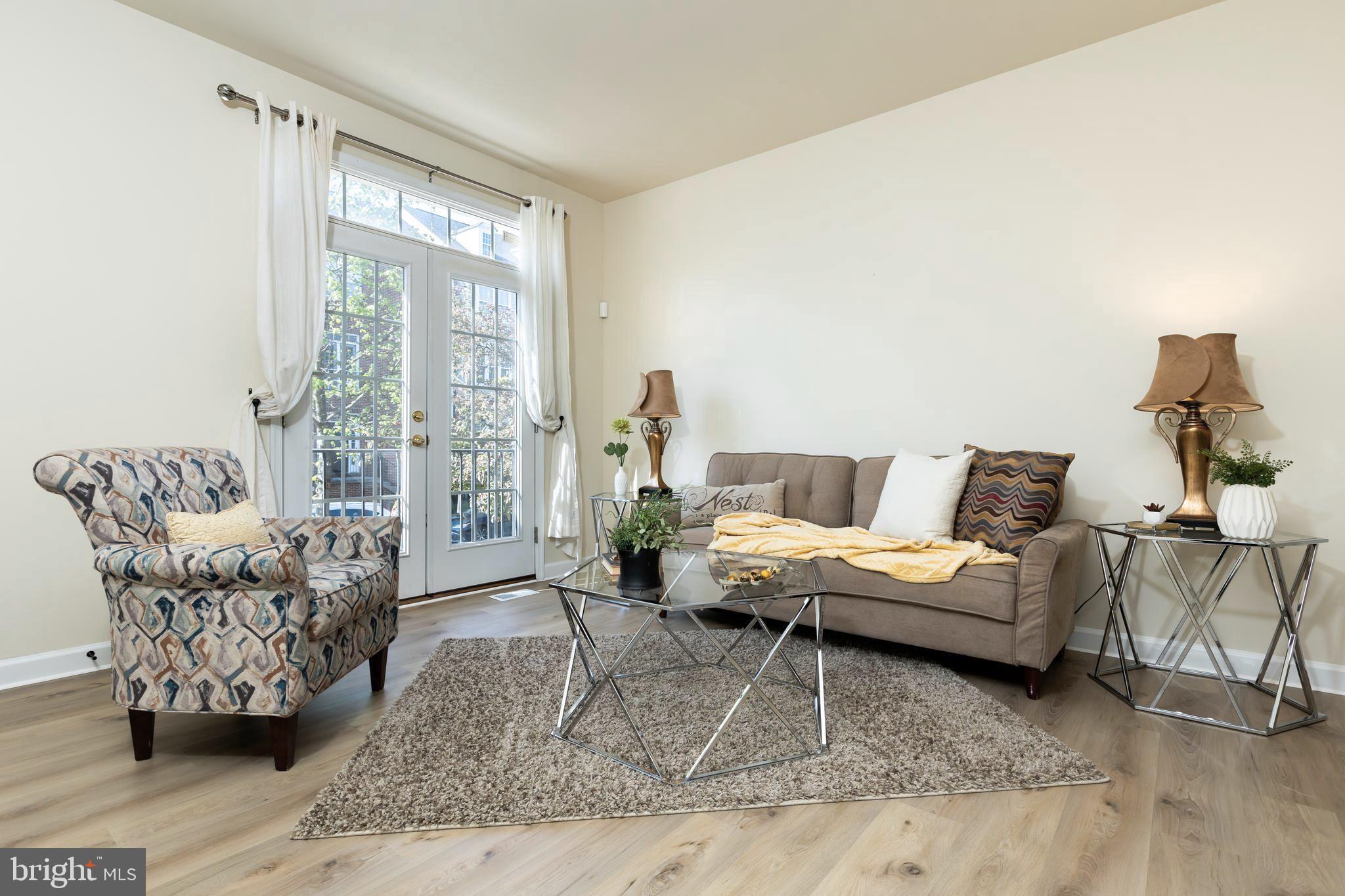 637 Spectator Avenue Landover, MD 20785 - Photo 5 of 54 a living room with furniture and a window