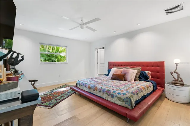 a bedroom with a bed and closet