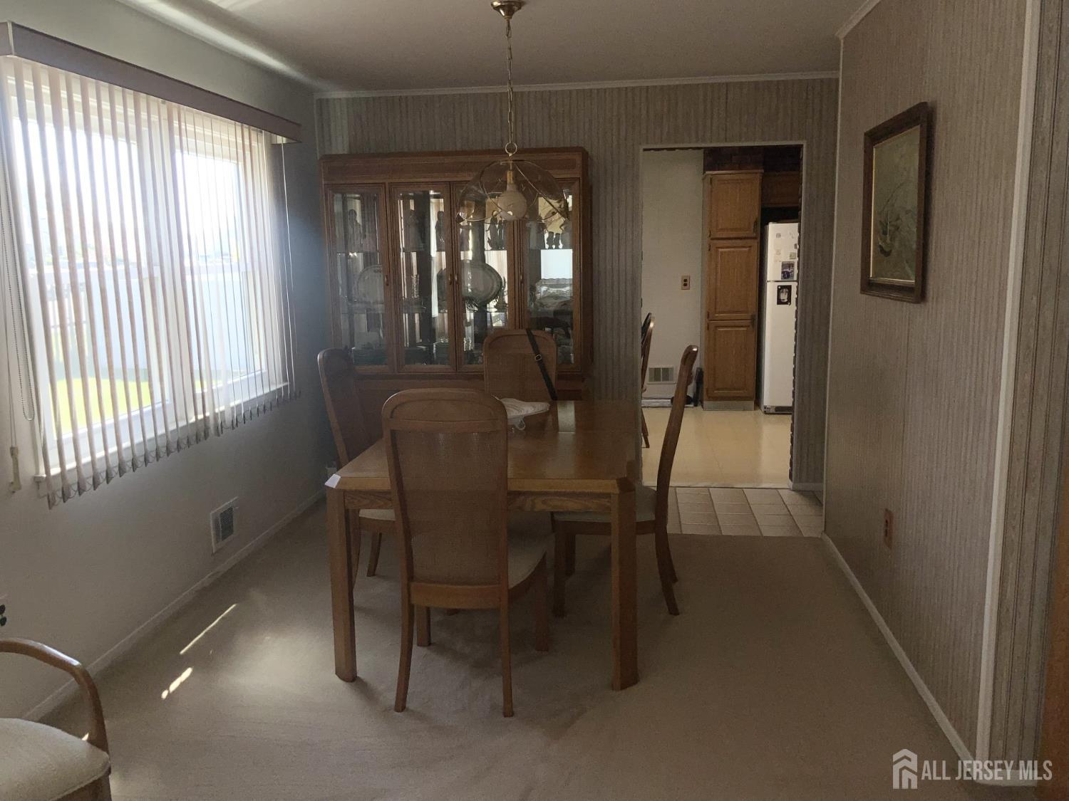 178 Willow Street Port Reading, NJ 07064 - Photo 5 of 15 a dining room with furniture and window