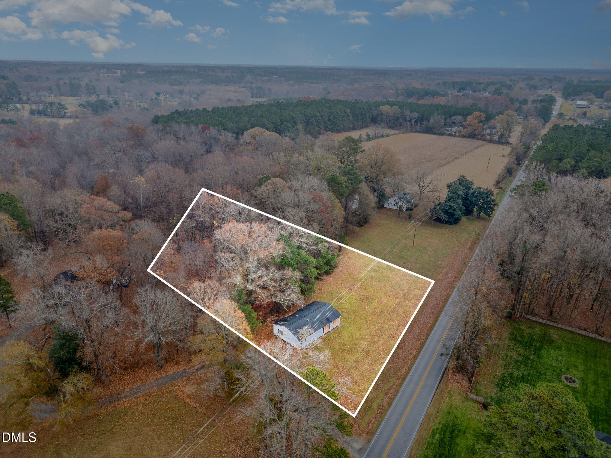 6801 Rock Service Station Road Raleigh, NC 27603 - Photo 1 of 36 an aerial view of house with a yard