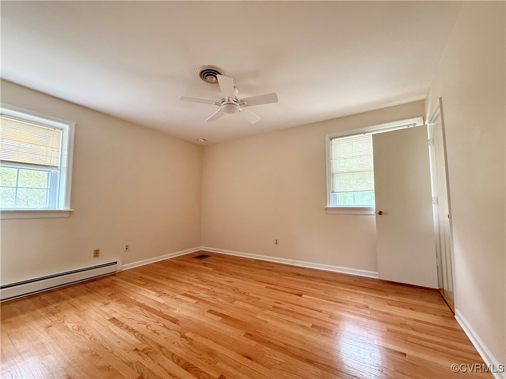 1410 Warminster Drive Midlothian, VA 23113 - Photo 12 of 22 a view of empty room with wooden floor and fan