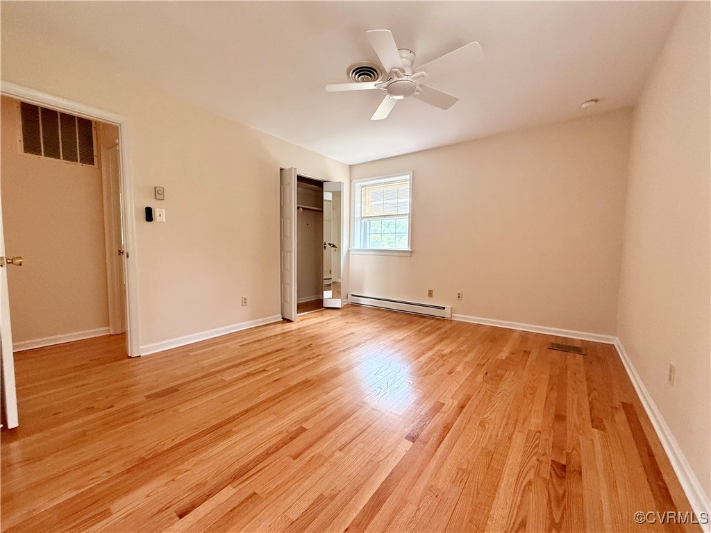 1410 Warminster Drive Midlothian, VA 23113 - Photo 13 of 22 a view of an empty room with wooden floor