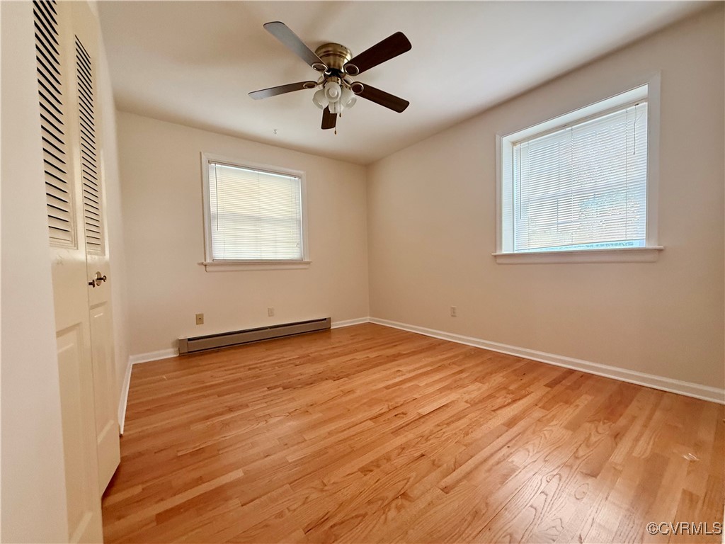 1410 Warminster Drive Midlothian, VA 23113 - Photo 15 of 22 wooden floor in an empty room with a window