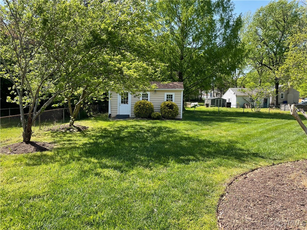 1410 Warminster Drive Midlothian, VA 23113 - Photo 21 of 22 a front view of a house with garden