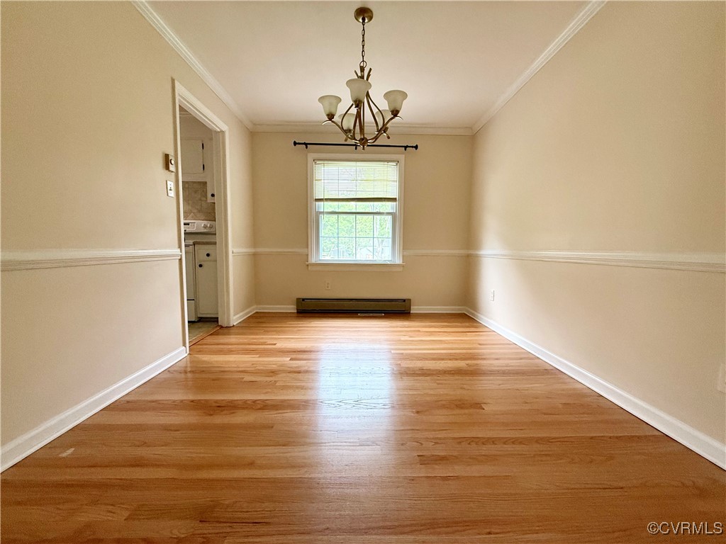 1410 Warminster Drive Midlothian, VA 23113 - Photo 4 of 22 a view of empty room with wooden floor and fan