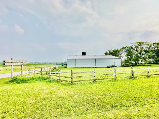 a view of an ocean with a swimming pool