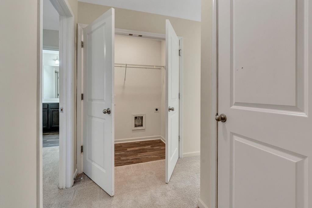 1938 Millstream Hollow Conyers, GA 30012 - Photo 8 of 16 a view of a bathroom with a sink