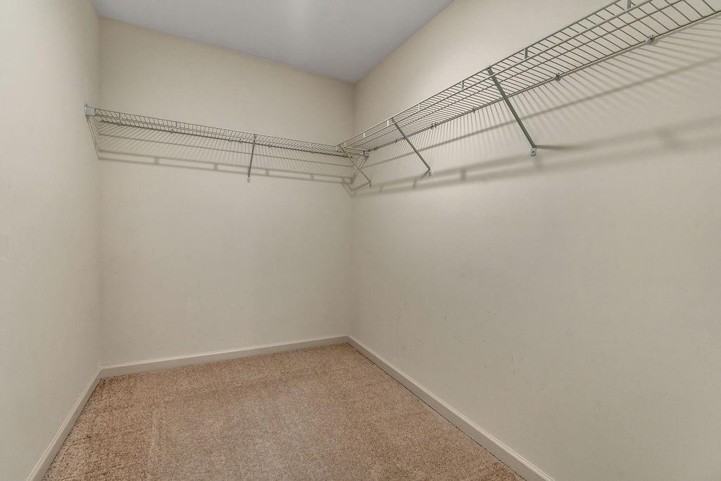 1938 Millstream Hollow Conyers, GA 30012 - Photo 10 of 16 a view of a room with racks on the wall