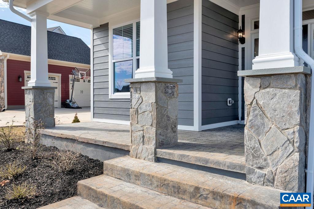 37 Wexford Ridge Road Ruckersville, VA 22968 - Photo 5 of 41 a front view of a house with a fountain
