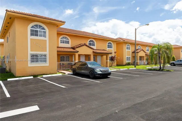 a car parked in front of a building