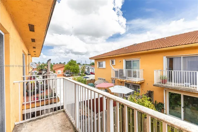 a view of a balcony with city view