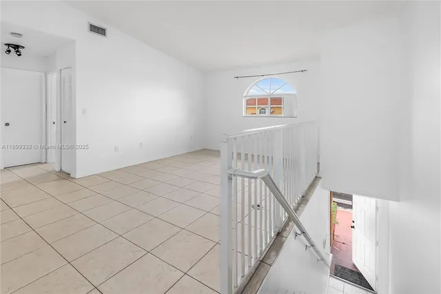 a view of a hallway with closet