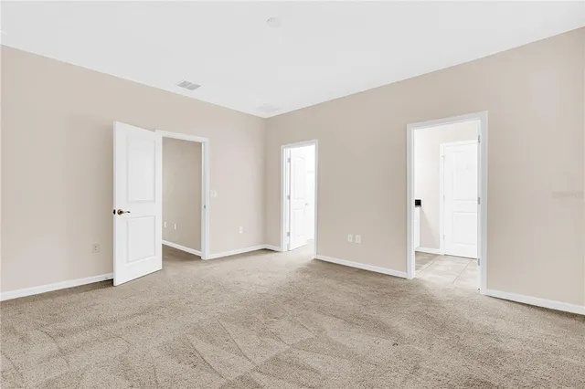 a view of a room with racks on the wall