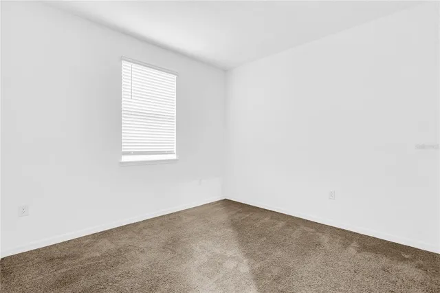 a bathroom with a sink toilet and a mirror