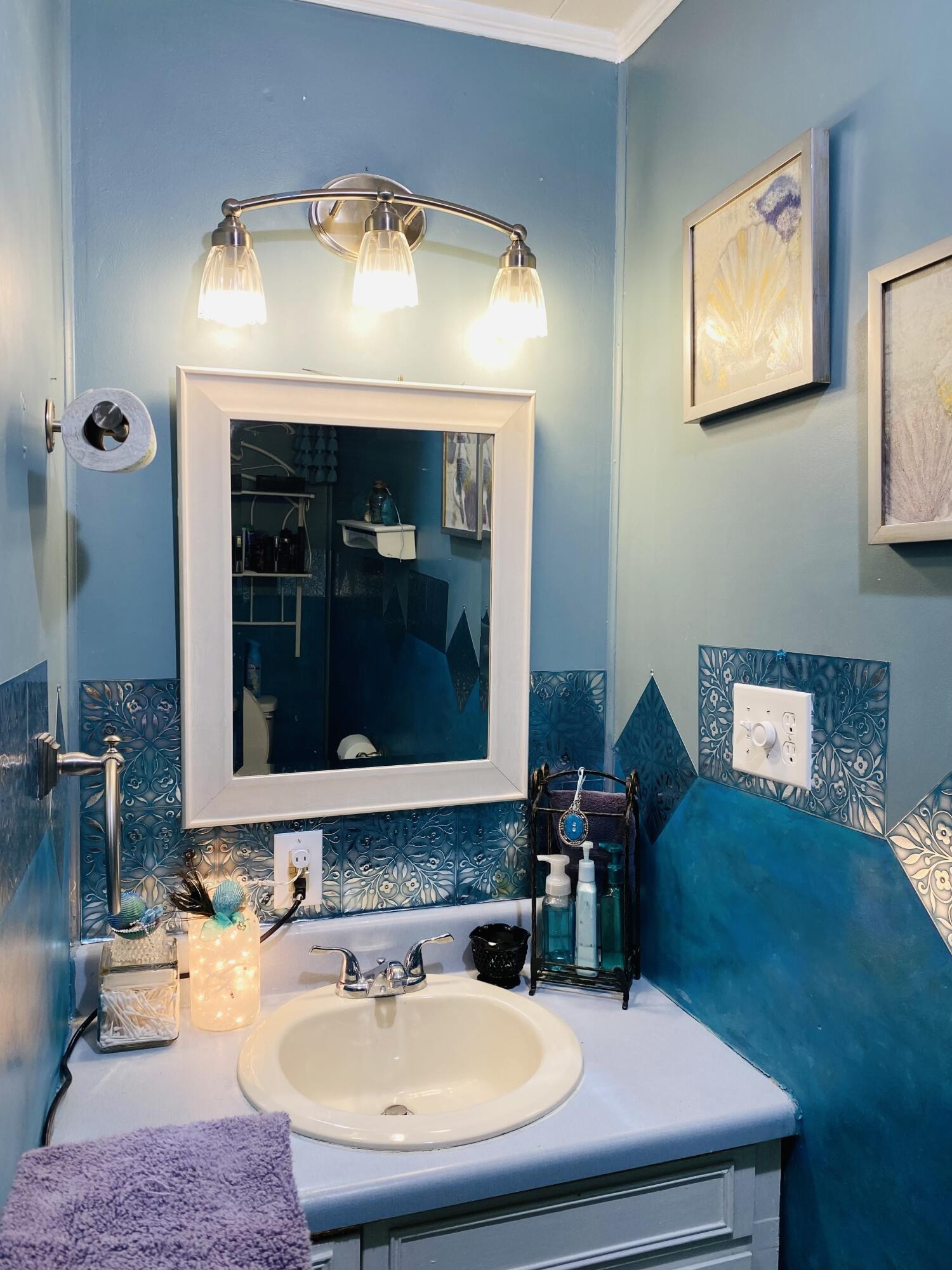 725 Durkee Road Southeast Cleveland, TN 37323 - Photo 11 of 24 a bathroom with a sink and a mirror