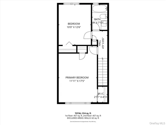 a picture of a bench in front of a wall