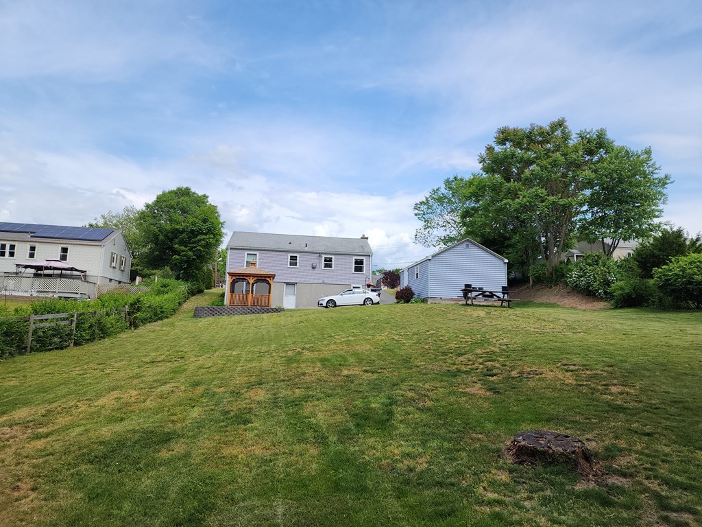 946 Bradley Road Springfield, MA 01109 - Photo 5 of 16 a house view with a garden space
