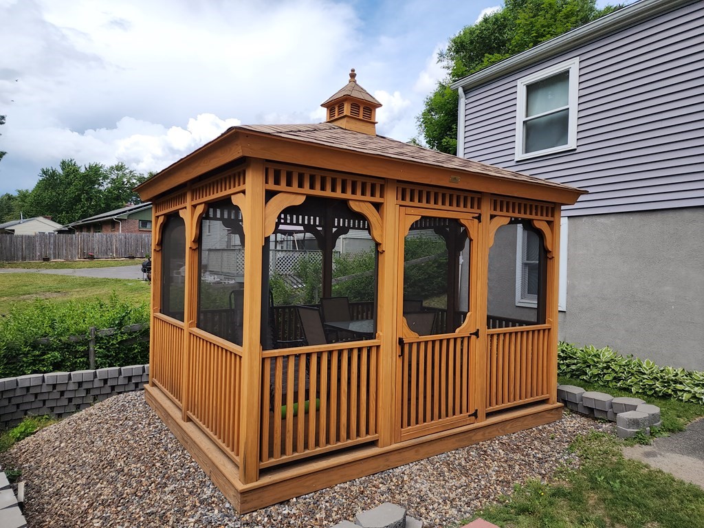 946 Bradley Road Springfield, MA 01109 - Photo 7 of 16 a view of a house with wooden fence