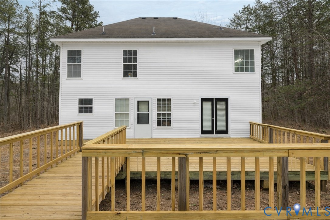 10 Rhodes Lane Cartersville, VA 23027 - Photo 11 of 16 Rear view of property featuring a deck and a shing