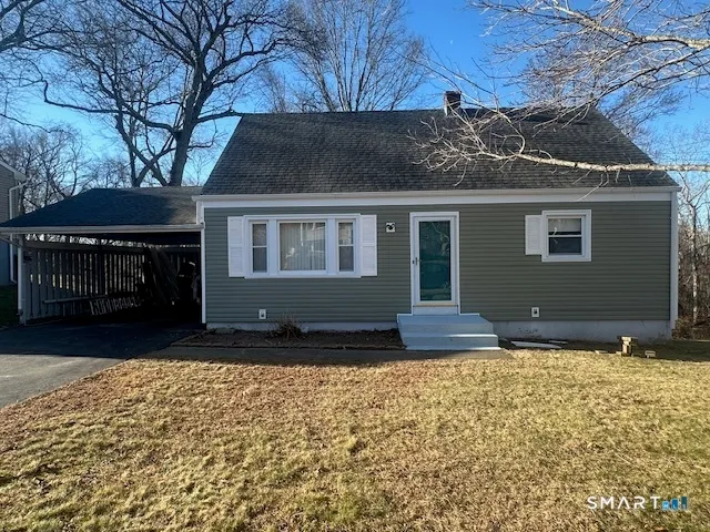 a front view of house with yard