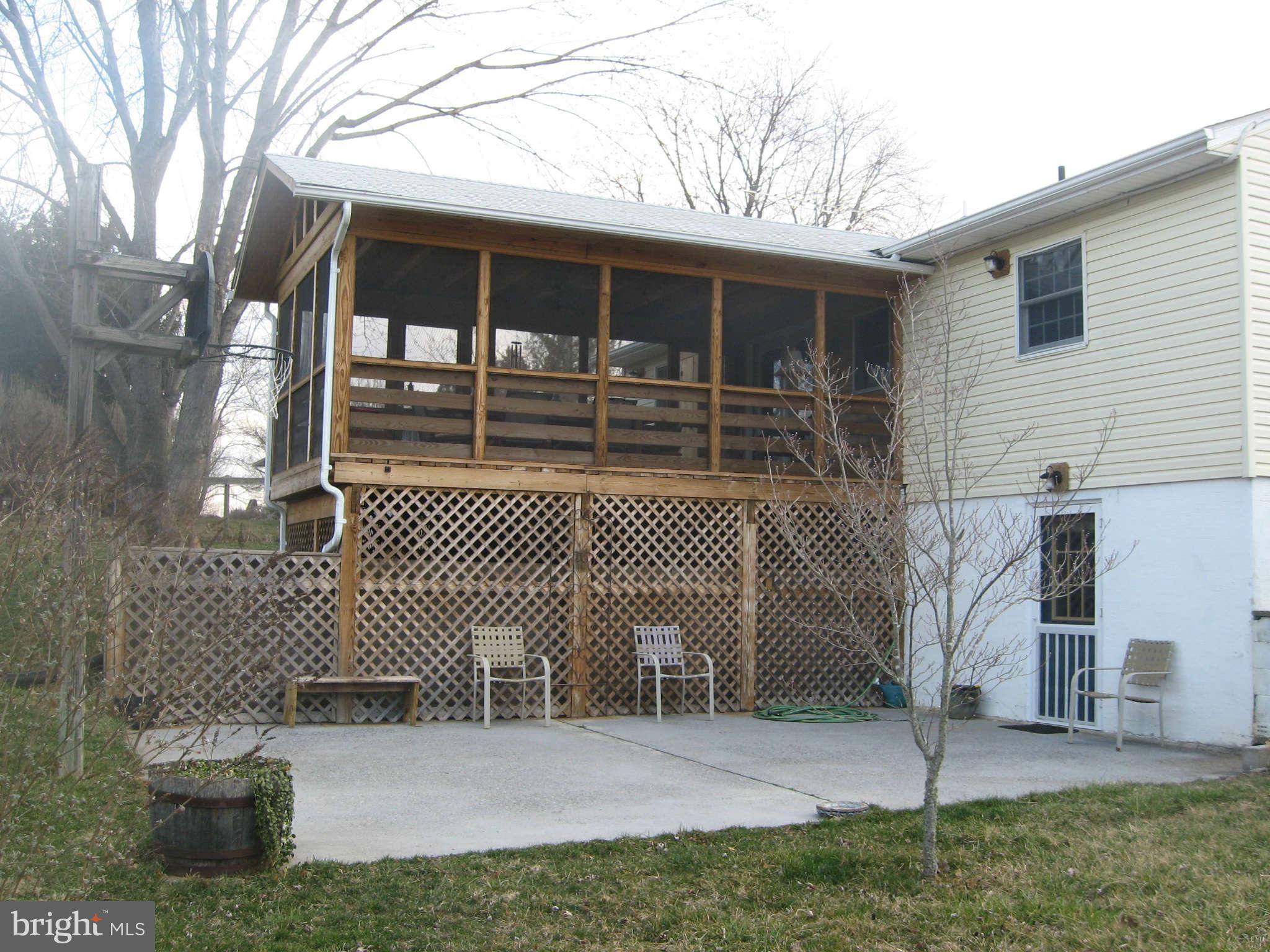 261 Shepherds Mill Road Berryville, VA 22611 - Photo 17 of 24 Rear Screened Porch & Patio